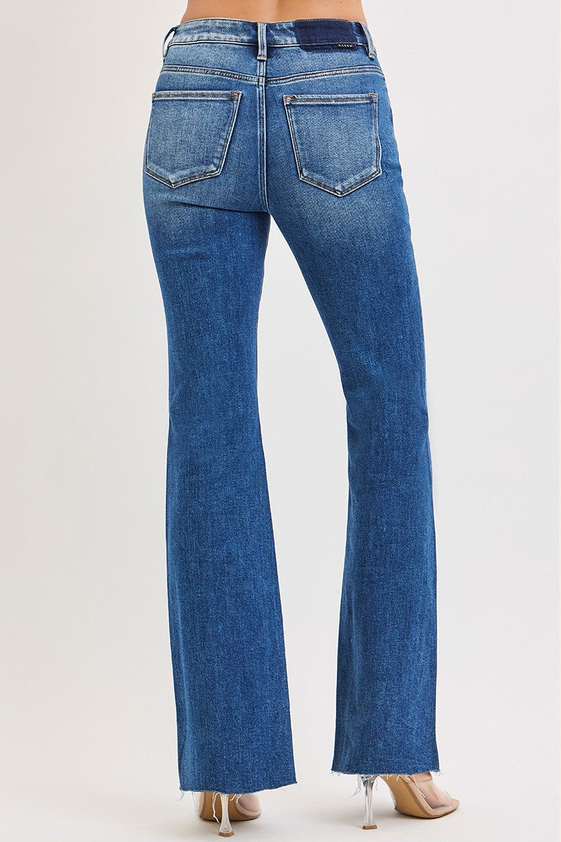 HIGH RISE FLARE JEANS WITH RAW CUT HEM